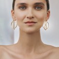 Asymmetrical circle earrings from the Holos HOK38-1 ORSKA collection