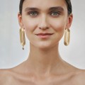 Oval gold earrings with gray crystal from the Holos HOK42-4 ORSKA collection