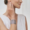 Wide, silvery bracelet with blue crystal from the Holos HOA118-1 ORSKA collection