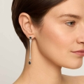 Silver dangling earrings with a black enamel pendant from the Minakari collection - ORSKA jewelry