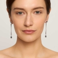 Silver dangling earrings with black enameled charms from the Minakari collection - ORSKA jewelry