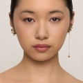 Asymmetrical earrings with light cherry blossom flowers from the Plantis collection – ORSKA jewelry
