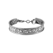 A stiff, hand-decorated bracelet from the Nepal collection