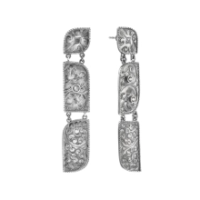 Long, hand-repussé earrings from the Nepal collection