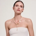 White snake necklace from the Kembali collection