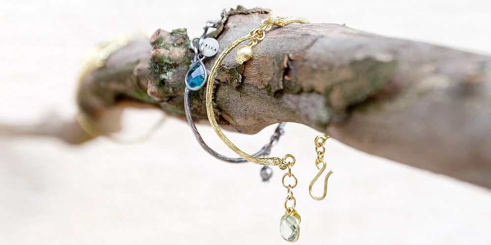 Silver and brass bracelets with natural stones