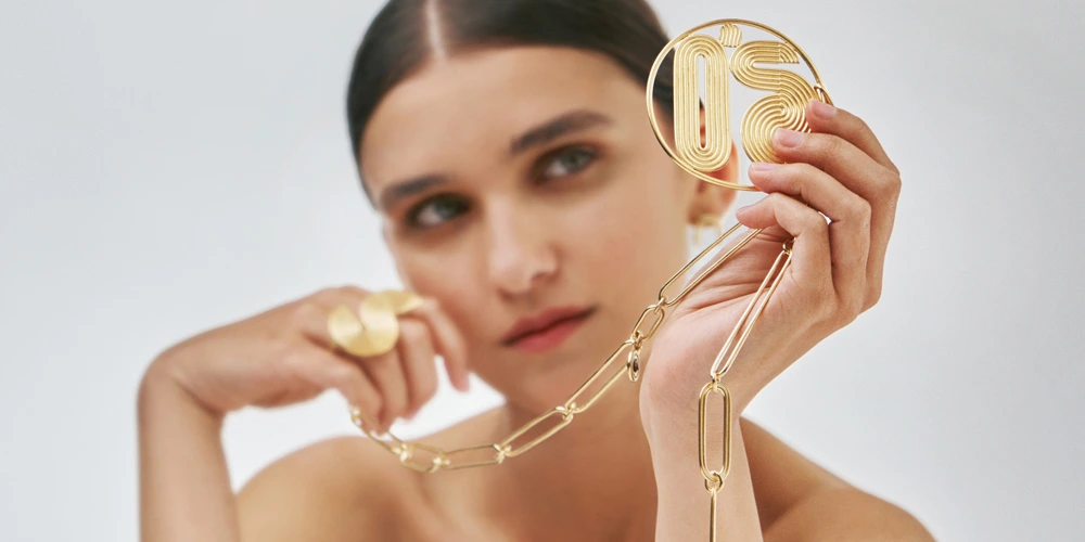 Goldplated pendant with symbols of the elements