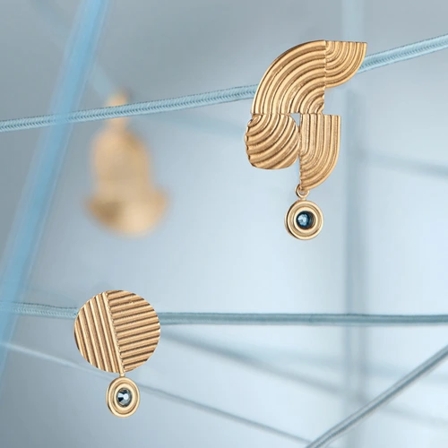 Goldpated pins with symbols of air and earth by ORSKA