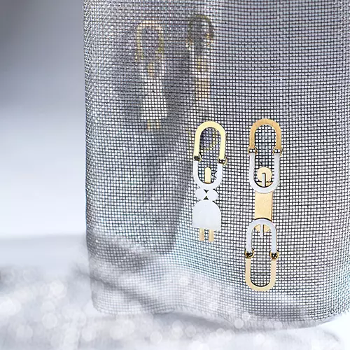 Silver, assymetric stud earrings by ORSKA jewelry
