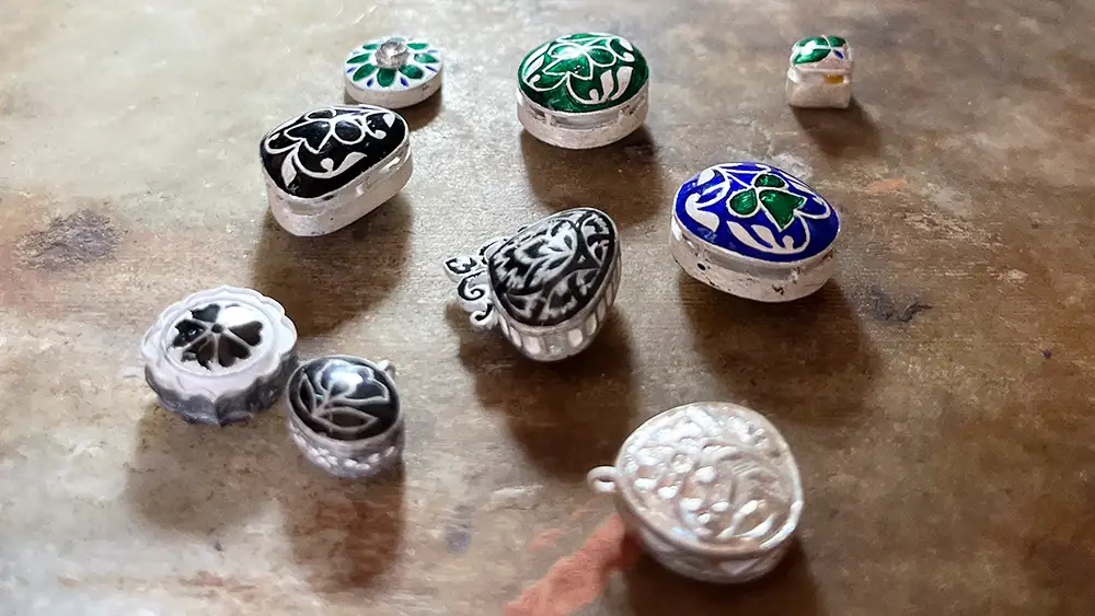 Finished components of enameled jewelry from the Minakari collection