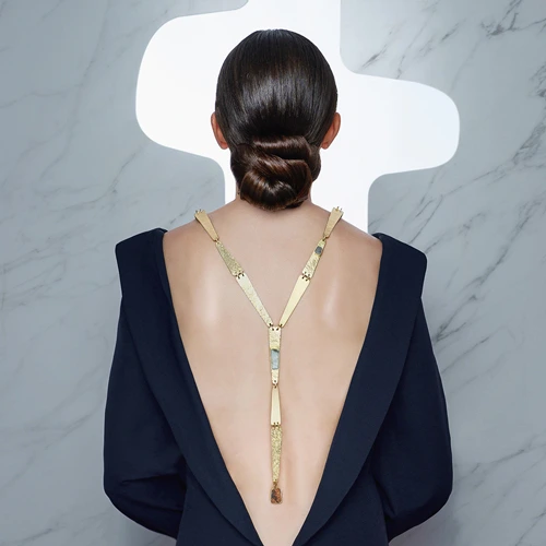 Long goldplated necklace with ceramics inspired by natural stones