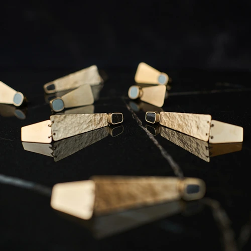 Goldplated earrings with ceramics from the Monumental collection byc ORSKA