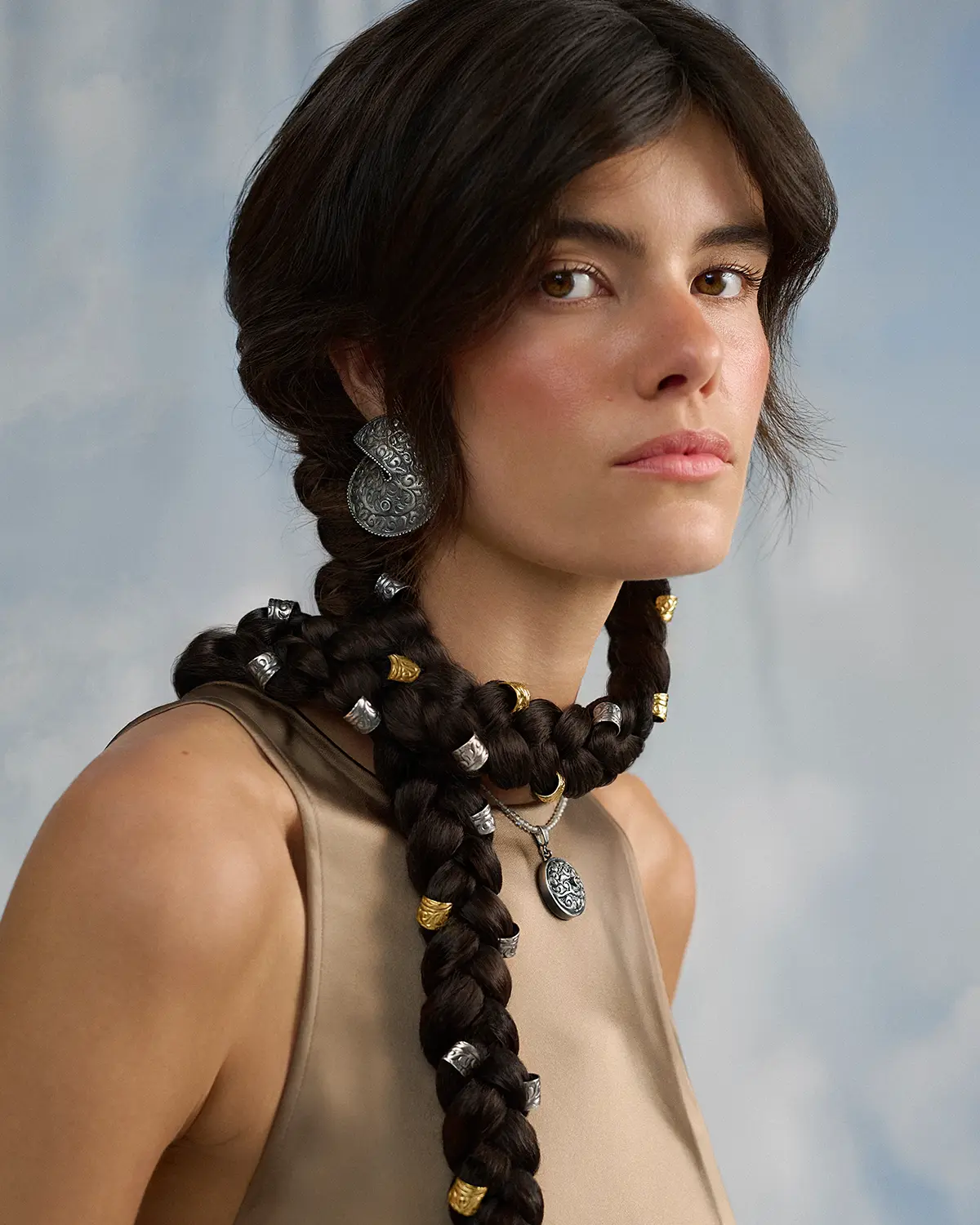 ORSKA silver and gold ear cuffs from Nepal