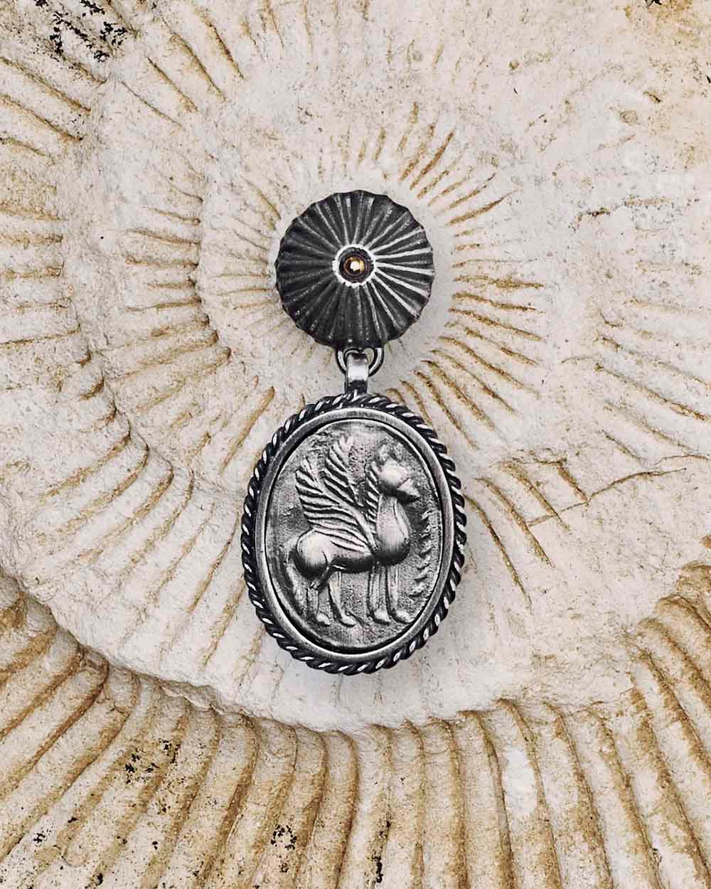 Silver, stud earring with pegasus from the Semios collection by ORSKA