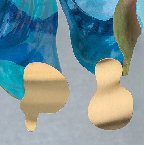 Assymetrical, gold earrings from Tache collection by ORSKA